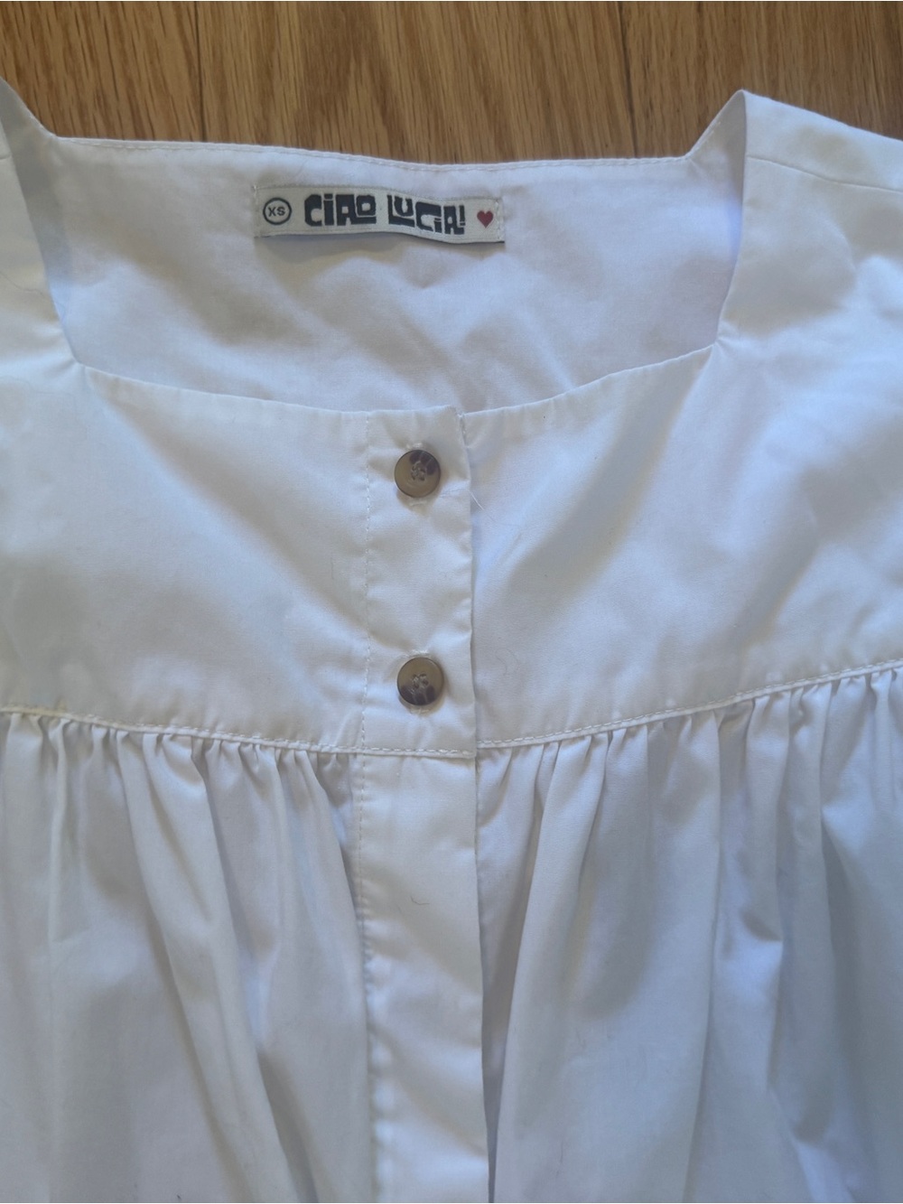 Ciao Lucia White Button-Front baby doll dress